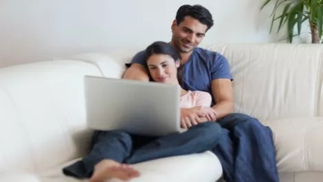 Couple watching movie on computer
